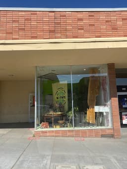 W/E Flowers-Ukiah Flower Shop logo